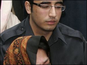 <b>...</b> sits at the grave of his mother with his aunt <b>Sanam Bhutto</b> on Saturday, <b>...</b> - Bilawal-Zardari-Sanam-Bhutto