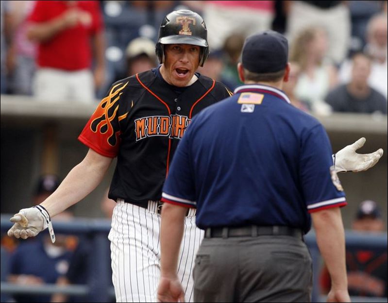  - Fireworks-too-hot-for-Mud-Hens-to-handle-Hessman-tossed-while-running-out-homer