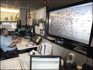  - EMS-dispatcher-Harold-McWilliams-911-command-center