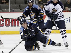 - Walleye-player-David-Toews-28-is-knocked-to-the-ice