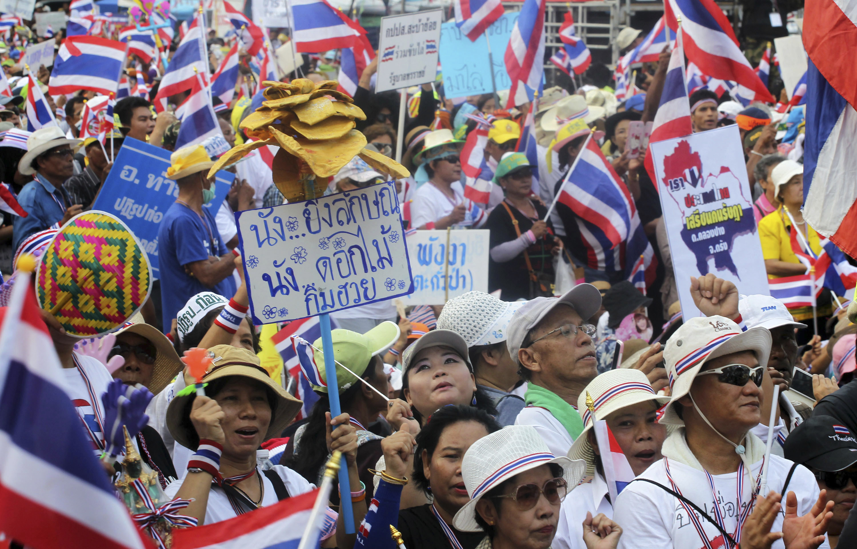 Thousands of antigovernment protesters march in Thai capital to demand