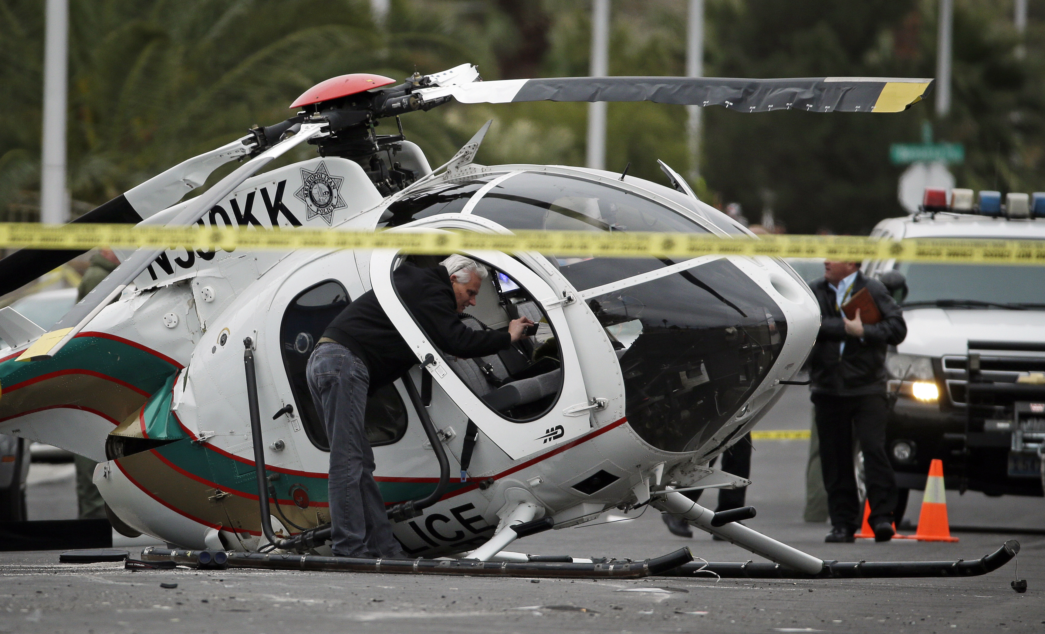 2 officers hurt in Vegas police helicopter crash The Blade