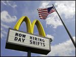 Rate dips to 5 percent; employment rises in July.