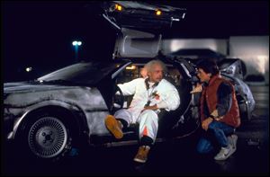 Christopher Lloyd, left, as Dr. Emmett Brown, and Michael J. Fox as Marty McFly in the 1985 film, 'Back to the Future.'