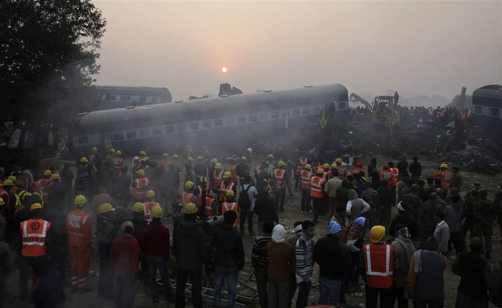 Rescuers look under Indian train wreck for bodies; 145 dead