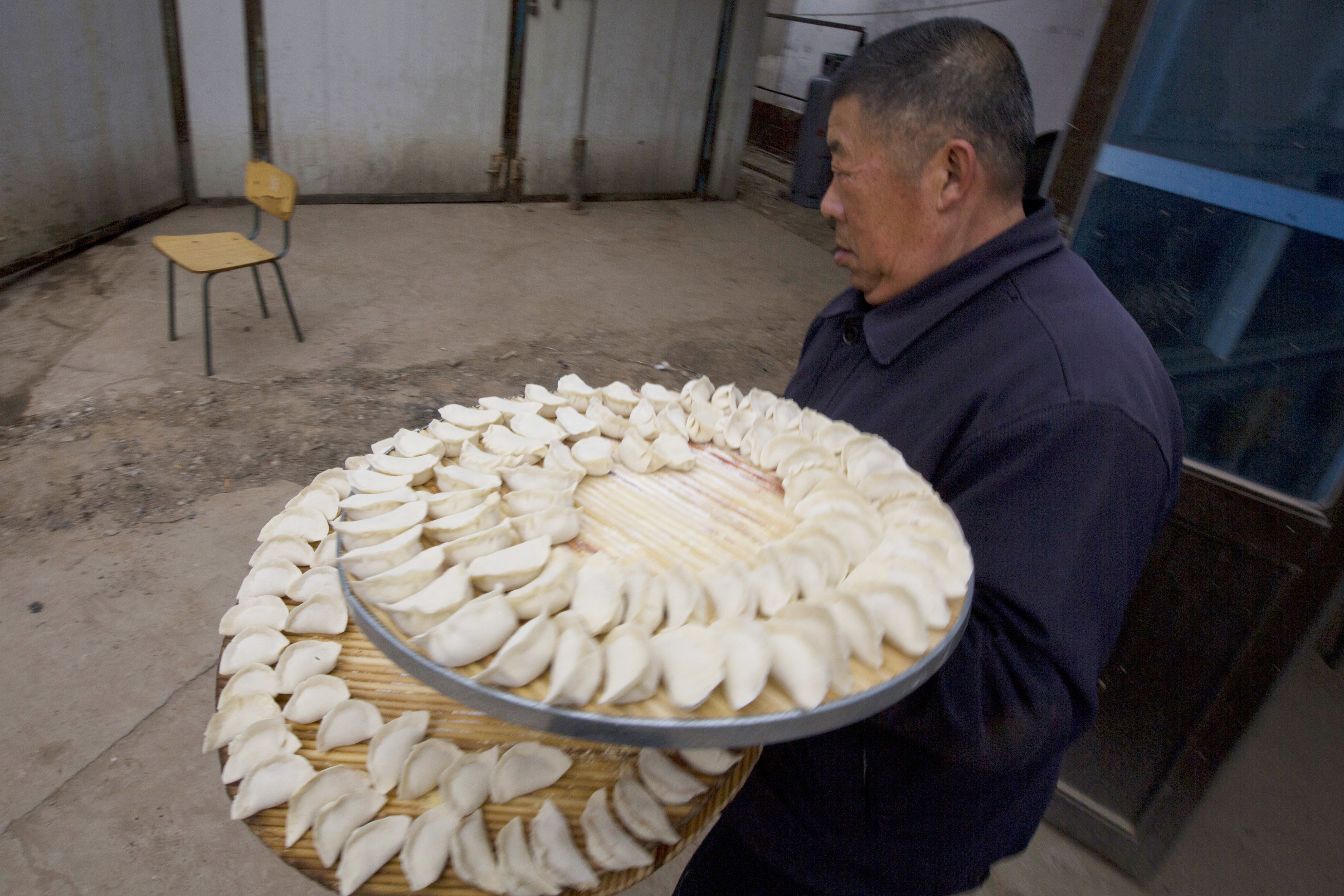 Chinese Lunar New Year feast begins with drums and dumplings - The Blade