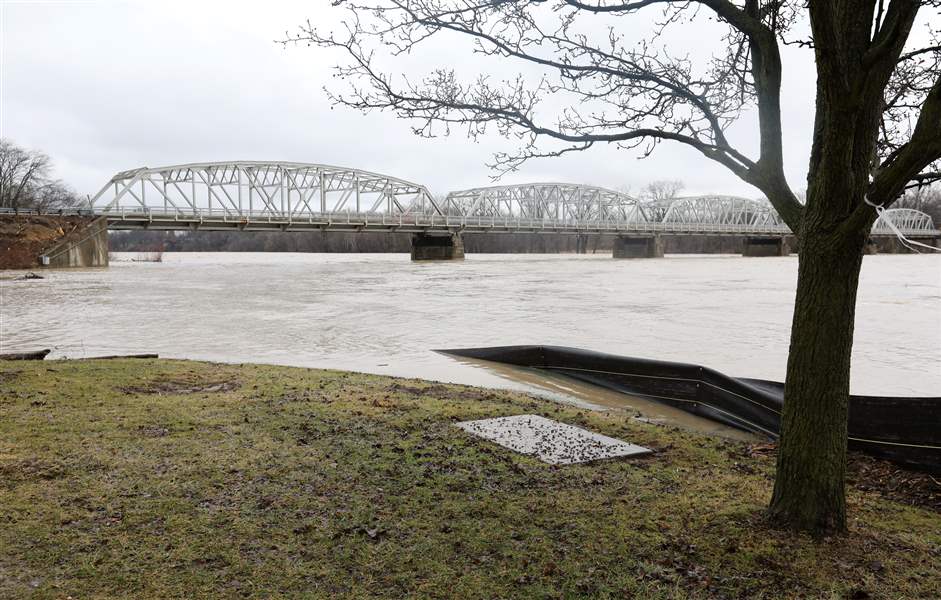 Tuesday's record warmth long gone, but region's river flooding persists