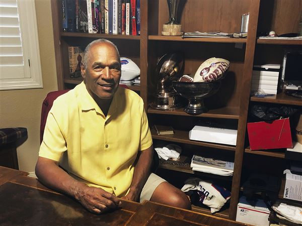 25 years after murders, O.J. says 'Life is fine'