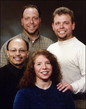 Judy Never's children are, clockwise from front, Bridget Bovee, Larry Gee, Richard Never, and Chuck Never, Jr. Mr. Gee was united with his siblings for the first time earlier this year.