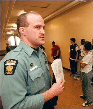 <xh>The number of officers in Toledo schools, like Russell Burke in Leverette Junior High, at right, will increase to 12 from its current 11 under the agreement now before council. Toledo has 14 junior and senior high schools.