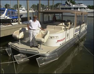 Dave Apling has sold pontoon boats for use on Devil's Lake for 20 years, but now is trying to float one 2,400 miles to Florida.