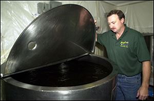 Jeff Nordhaus oversees a portion of the 210 gallons of sassafras tea made daily.