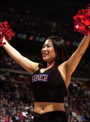 Jen Tserng, photographed at a recent Pistons game, says dancing is something fun to do in her spare time.