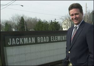 During his 11 years at Toledo's Arlington Elementary School, Jim Heer was known as caring. After he retired, the auditorium was named in his honor.