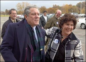 Tim Hagan, the Democratic challenger for Ohio governor, visits a middle school in Warren, Ohio, with his sister, Maggie Hagan.