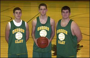 Seniors Bryan McDougle, left, and Matt Warner both had experience as starters last year. Sophomore John Nelson scored 19 points in a victory over Anthony Wayne.