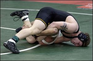 Waite's Josh Johnson scores back points against Westerville North's Kris Simmons. Johnson won 26-11.