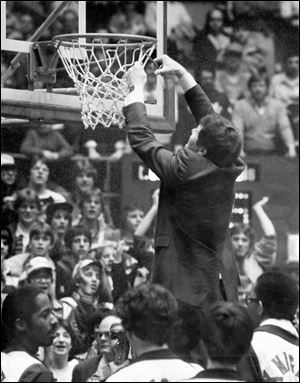 Val Glinka cuts down the nets after his St. Francis team won Toledo's first title in 1983.