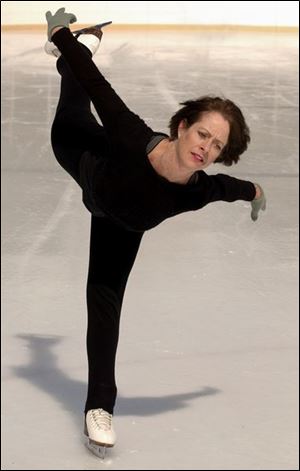 fea kay10p C March 10, 2003. Kay Anderson practices her figure skating routine at the Ottawa Park ice rink Monday afternoon. Blade photo by Jeremy Wadsworth