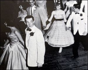 This photo from Waite High School's 1957 yearbook captures prom-goers on the big night.