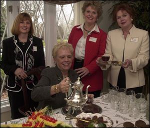 TEA TIME: From left, Joyce Stenberg, Barbara Bettinger, Claire Browning, and Penny Marks enjoy tea and company.