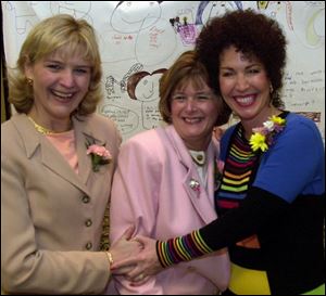 HELPING CHILDREN: From left, Susan Herring, Shelly Conyngham, and speaker Joni Arredia are all smiles before luncheon for the Family and Child Abuse Prevention Center. 