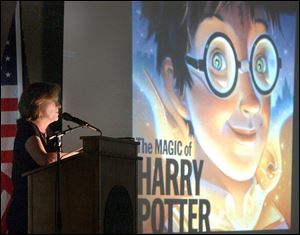 `It could have been anyone illustrating this book, and I'm lucky I said yes,' Mary GrandPr  tells a crowd of nearly 300 at the University of Findlay. Ms. GrandPr , who lives in St. Paul, has illustrated the five U.S. editions of the popular Harry Potter series by J.K. Rowling.