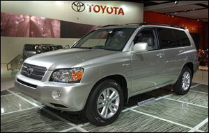 Toyota's Highlander hybrid has already reached Toledo, area car dealers have said.