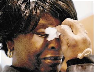 Armeuda Terry, sister of Tyrone Terry, reacts after the Ohio Parole Board delayed the release of Tyrone from the Marion Correctional Institution until Jan. 2, 2008.