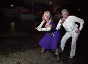 CUTTING THE RUG: Pat Cloud and Dale Malpezzi of Allen Park, Mich., show off their strut at Centennial Terrace.