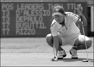 Russamee Gulyanamitta aligns a putt on the 18th hole during the OC Classic at Highland Meadows.