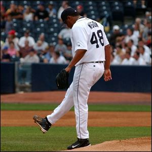 Mud Hens pitcher Lino Urdaneta shows his displeasure aftergiving up a three-run homer to Steve Scarborough.