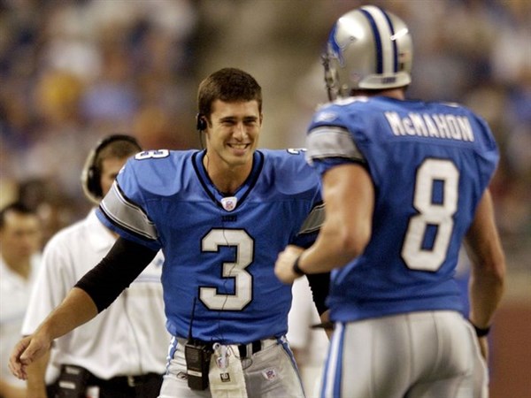 Detroit Lions quarterback Joey Harrington (#3) runs for a 26-yard