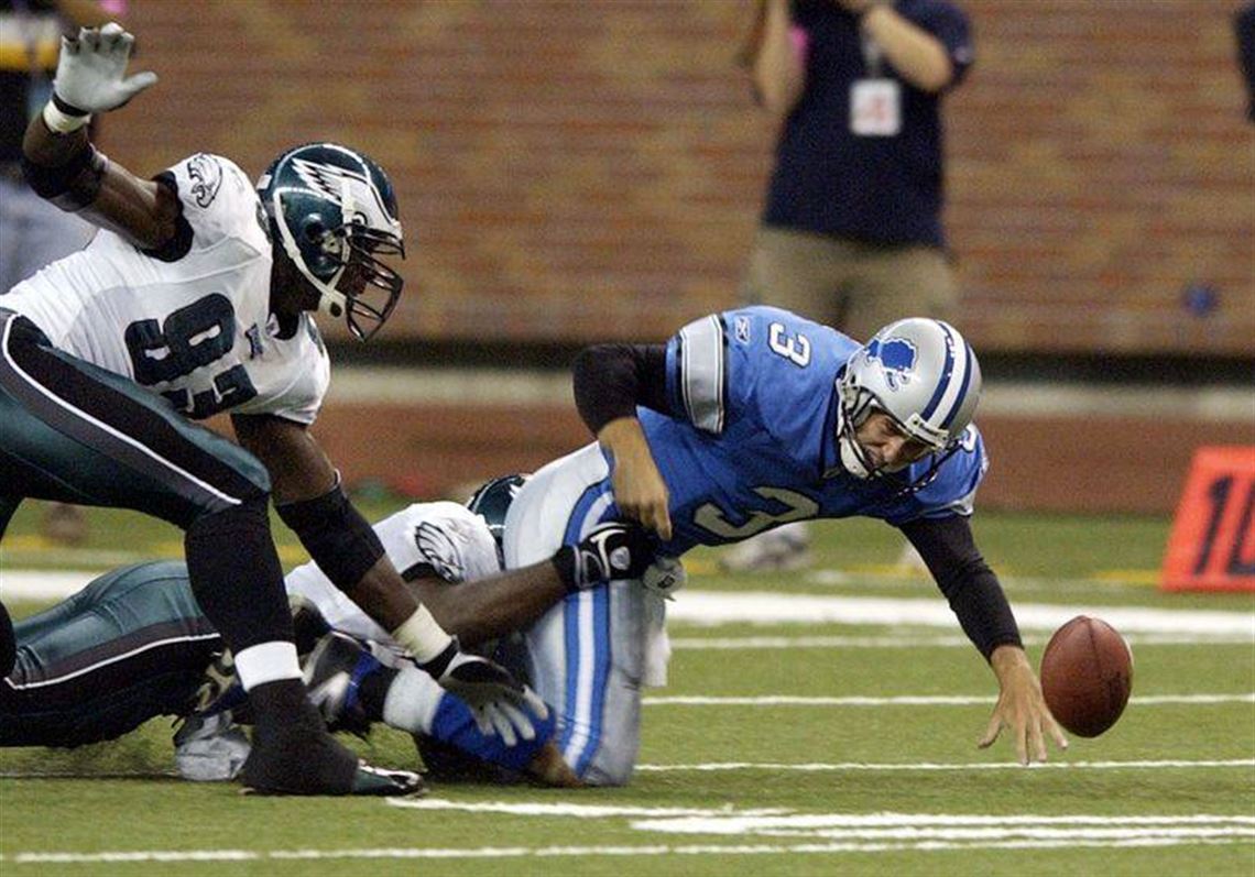 Detroit Lions quarterback Joey Harrington breaks down field as the