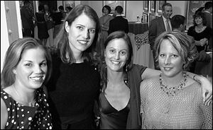 Something Swanky committee members included, from left, Amanda Bublick, Terri McCullough, Lisa Knight DeVilbiss, and Julia Smirnov. The event raised funds for cancer patients.