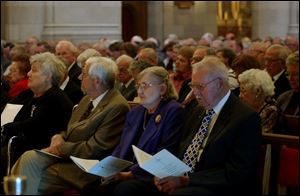 The Toledo Catholic Diocese honored almost 400 couples who have been married for over 25 years at the Rosary Cathedral on Collingwood Blvd. Lisa dutton 10/10/2004 REL ANNIV10P 1 .jpg