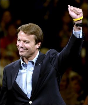 Democratic vice presidential candidate John Edwards greets a rally at Mentor High.