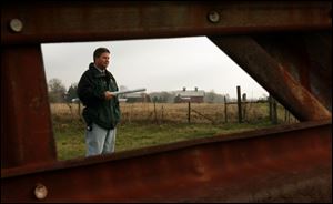 Steve Gruner of the Sandusky County Park District inspects the future site of Creek Bend Farm Park. The planned park will emphasize farming from the early to mid-20th century.