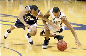 Keith Triplett, at right against Nevada last month, is Toledo's leading scorer at 14.4 points per game. He also leads the Mid-American Conference with 3.2 steals per game.