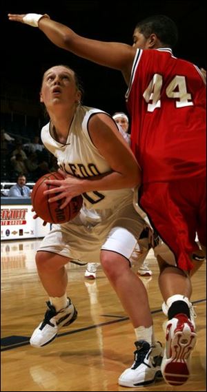 Danielle Bishop hit 7 of 11 shots from the field in the seond half and a total of six 3-pointers - a career best - to help Toledo open the Mid-American Conference season with a victory.