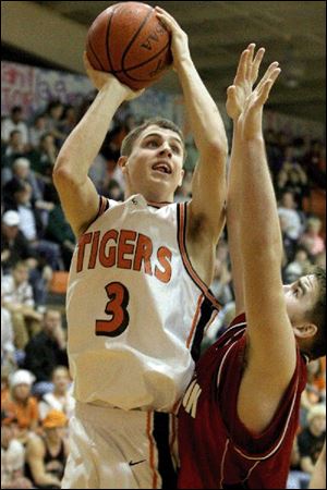 Tory Rasey takes a shot for Liberty Center. Rasey scored four
points in the defensive battle last night against Wauseon.