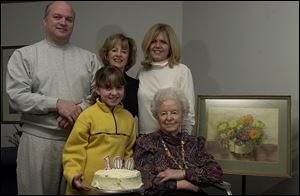 Grandson Stephen Slayton, top row, daughter Susan Cowling, granddaughter-in-law Elaine Slayton, and great-great granddaughter Emma Slayton, helped Marian Childs celebrate her birthday.