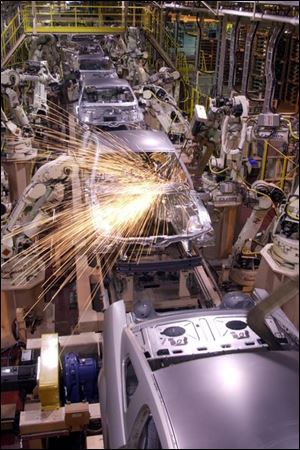 Ford preserved jobs by adding Mustang production last year at this Flat Rock, Mich., plant.