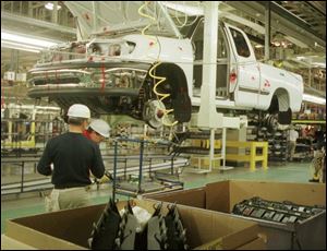 While in Indiana, this Toyota truck plant 30 miles north of Kentucky is an example of auto jobs shifting southward.