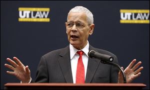 Julian Bond addresses a large crowd at the University of Toledo's college of law.