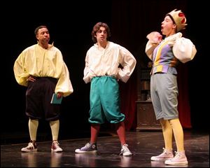 Among the cast members in the University of Toledo s production of The Complete Works of
William Shakespeare (abridged) are, from left, Grant Walker, David Corris, and Abby Youngs.
