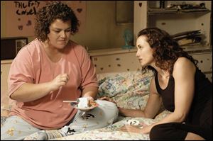 Rosie O Donnell, left, plays a developmentally disabled woman and Andie MacDowell portrays
the sister who is forced to care for her in the Hallmark Hall of Fame movie Riding the Bus With
My Sister, which is scheduled to air tomorrow night on CBS.