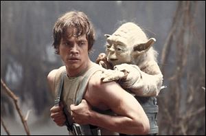 Yoda, a reluctant teacher, challenges Mark Hamill as Luke Skywalker.
