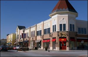 One tenant has rented offices in the area above the shopping center's stores but has yet to move in.