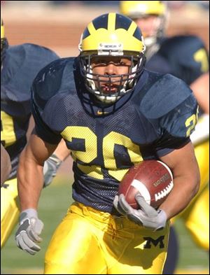 Michigan running back Mike Hart holds the national high school record of 204 TDs.